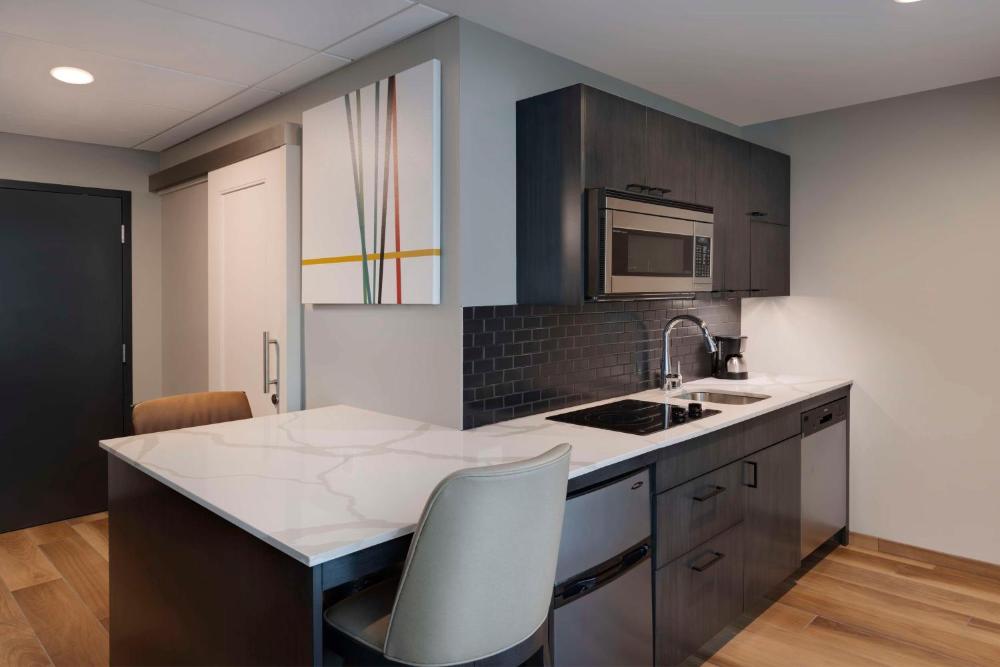 Studio Suite with Two Queen Beds, Sofa Bed and Kitchen interior